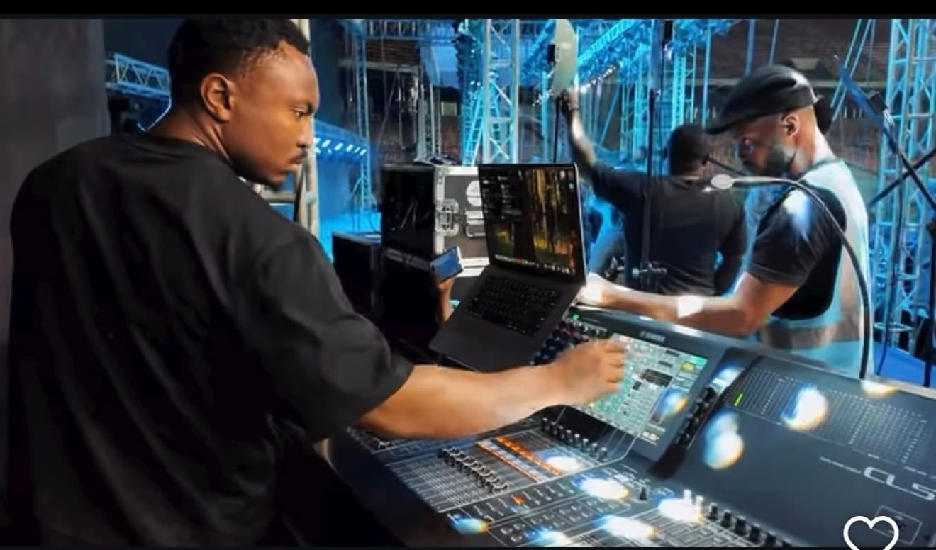 Apprentice on stage during setup